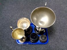 A tray of silver plated trophies on stands bearing badges