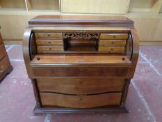An antique mahogany barrel fronted bureau (as found)