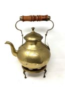 A brass kettle and trivet (2)