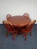 A circular pedestal extending kitchen table together with four chairs and two further boxed flat