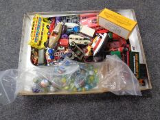 A box containing a quantity of 20th century die cast vehicles,