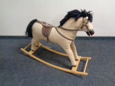 A soft toy rocking horse