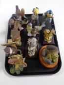 A tray containing assorted animal ornaments to include Heredities hedgehog family,