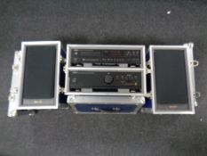 A Denon compact disc player DCD-715 together with a Denon integrated amplifier PMA-100M in flight