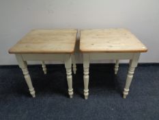 A pair of stripped pine square topped cafe tables on painted bases