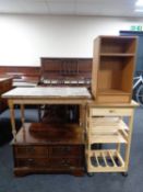 A pine kitchen trolley fitted a drawer together with a teak effect bedside stand,