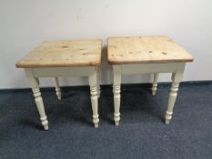 A pair of stripped pine square topped cafe tables on painted bases