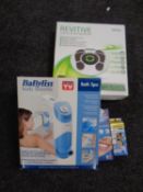 A Revitive circulation booster together with a Babyliss bath spa,