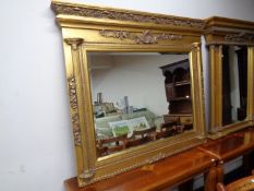 A Victorian style gilt framed bevel edged over mantel mirror,