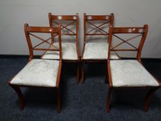 A set of four Regency style dining chairs