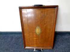 An Edwardian oak twin handled serving tray