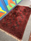 A Bokhara rug, Afghanistan, 174 x 264 cm CONDITION REPORT: Some moth damage.