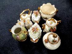 A tray containing pair of Capodimonte lidded pots in the form of pineapples,