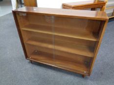 A set of 20th century sliding glass door bookshelves