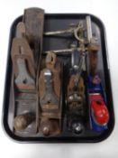 A tray containing three Stanley woodworking planes together with two others