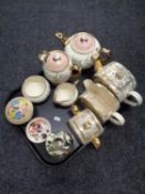 A tray containing a three piece Sadler tea service, a four piece Gibson tea service,