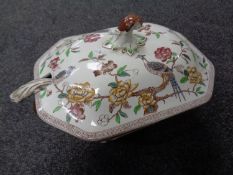 A 19th century soup tureen with ladle