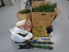 An 8ft Christmas tree with lights and decorations