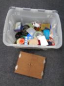 A box containing a quantity of fishing flies,