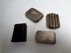 Four antique vesta cases