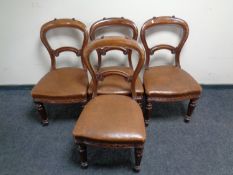 A set of four Victorian mahogany dining chairs
