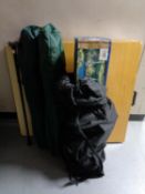 Two folding camping tables together with a gazebo,