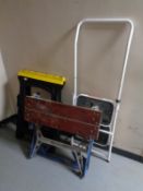 A set of folding steps together with a work bench, two trestle stands,