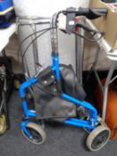 A mobility walking aid together with two zimmer frames