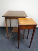 A late 19th century inlaid mahogany two tier occasional table together with a plant stand