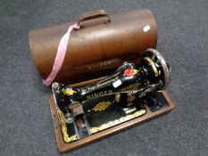 A cased 20th century Singer hand sewing machine