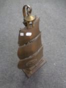 An antique cast iron companion stand with companion pieces in the form of a galleon