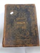 An antiquarian leather bound Brown's self interpreting family bible with colour book plates