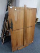 A draftsman's drawing board with rule together with two rolls of tracing cloth