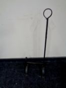 A cast iron boot scraper