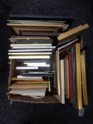 A box containing a large quantity of assorted picture frames, mirrored frames, prints,
