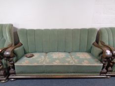 A continental four piece lounge suite with oak frame comprising of three seater settee and three