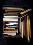A box containing a large quantity of assorted picture frames, mirrored frames, prints,