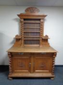 A 19th century oak sideboard with shelf,