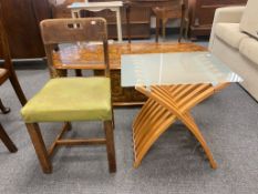 A contemporary folding occasional table and an oak chair