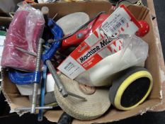 A box containing clamps,