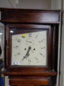A 19th century mahogany longcase clock with painted dial with pendulum