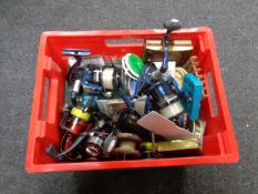 A box of fishing reels,