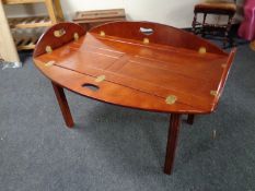 A mahogany butler's tray on stand