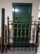 A Victorian brass and metal 4' bed fame