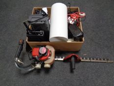 An exercise bike together with a hedge trimmer and a box of electricals