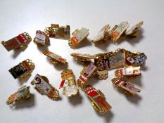 A collection of enamelled Olympic badges by Kodak