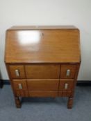 An early 20th century oak bureau