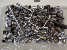 A box of containing a large quantity of metal sockets