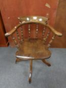 A traditional style swivel office chair