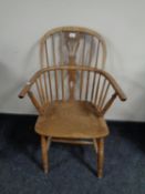 A 19th century elm Windsor chair